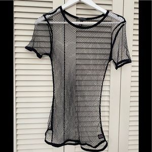 Black fishnet shirt.